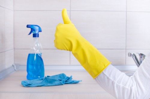 Cleaner treating high-traffic carpet areas in a local business premises