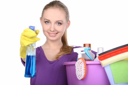 Technician applying safe cleaning procedures to carpet