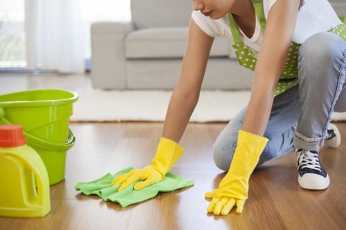 Deep cleaning a tiled floor with attention to grout and edges